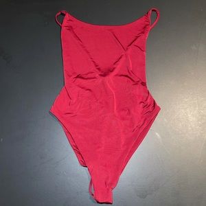 Red open back one piece bathing suit